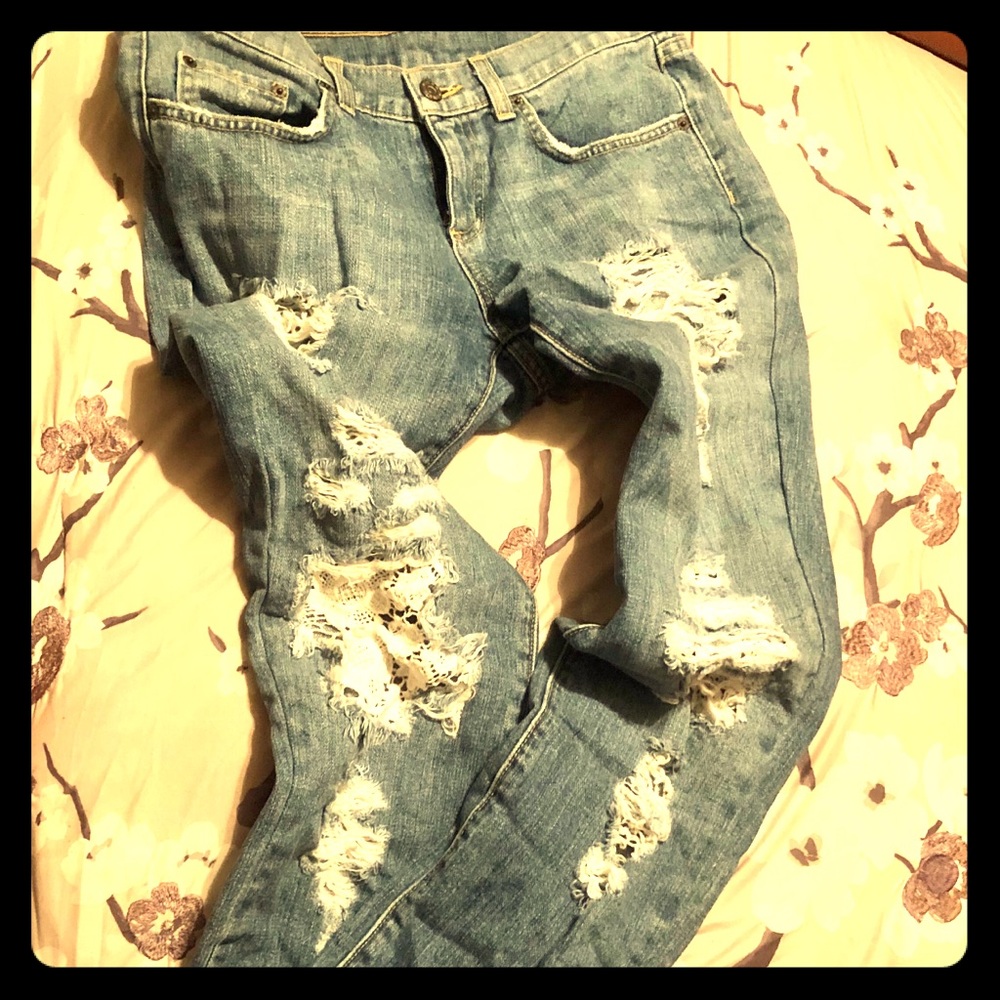 NWOT Women’s CARMAR distressed blue jeans.